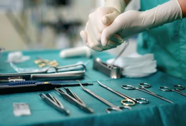 a-doctor-with-gloves-using-surgical-instruments-be-2025-02-03-16-59-07-utc-min